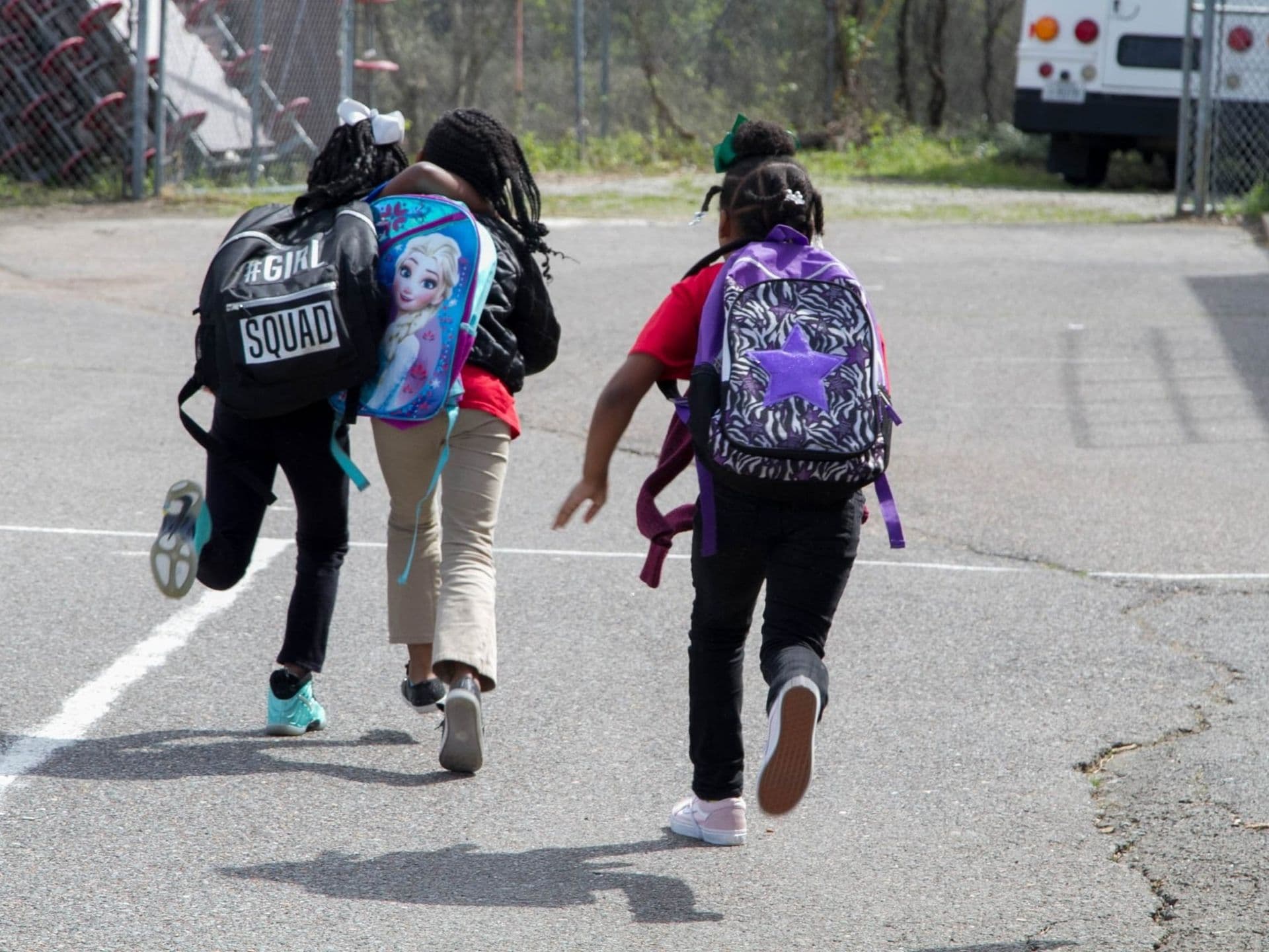 Students heading to the Creative Life bus